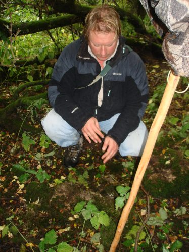 Chris Corlett - Archaeologist examining site | Roundwood Tidy Towns