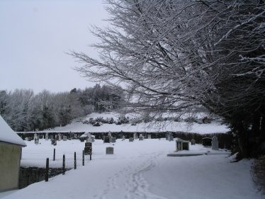 Church graveyard in the snow | The Askanagap Community Development Association