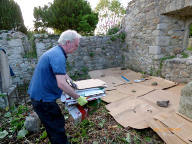 Maurice laying mulch aka cardboard to keep the weeds suppressed in an eco friendly manner, pending further work.  | The Medieval Bray Project